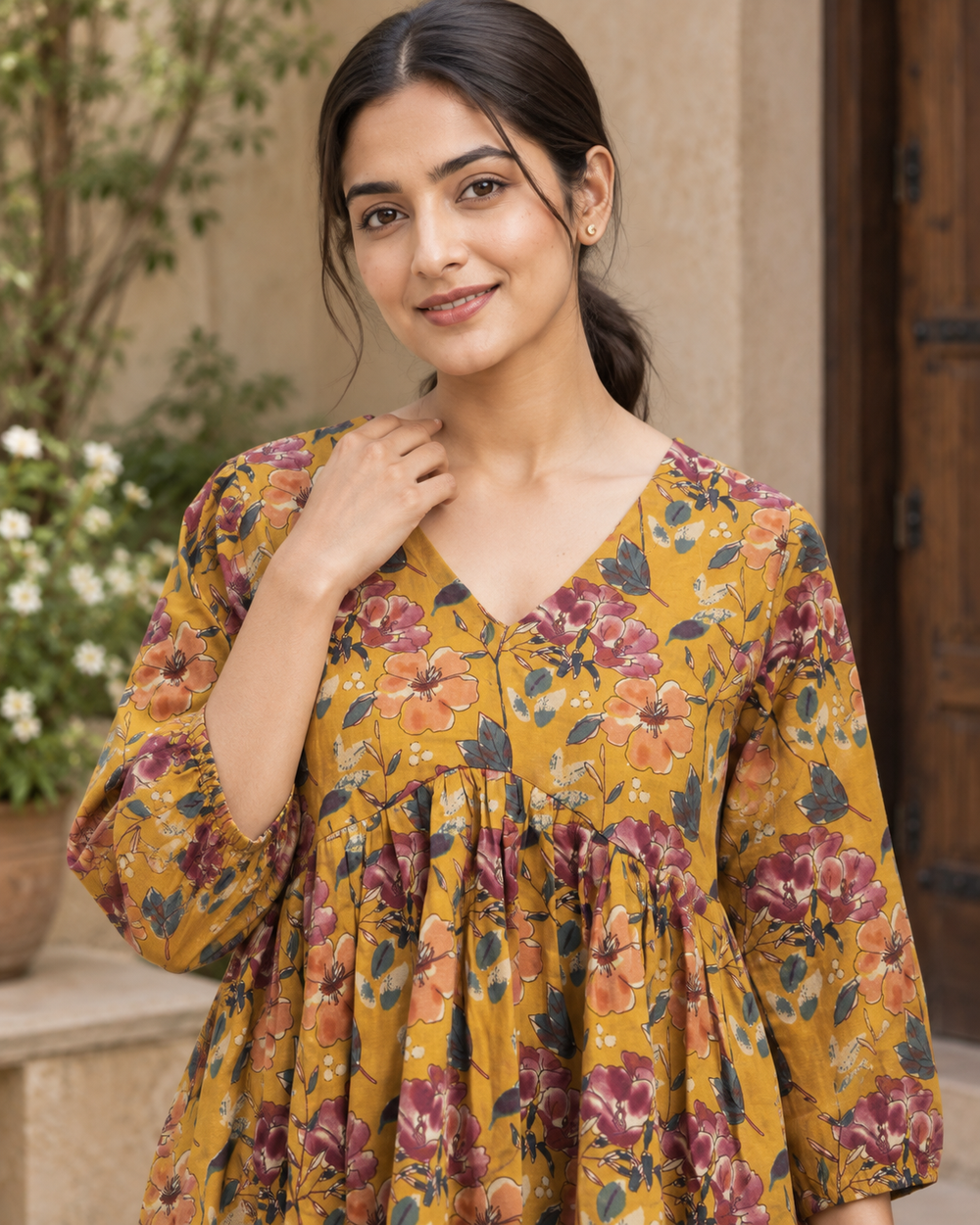 Women's Mustard Floral Print Peplum Top closeup — view 3